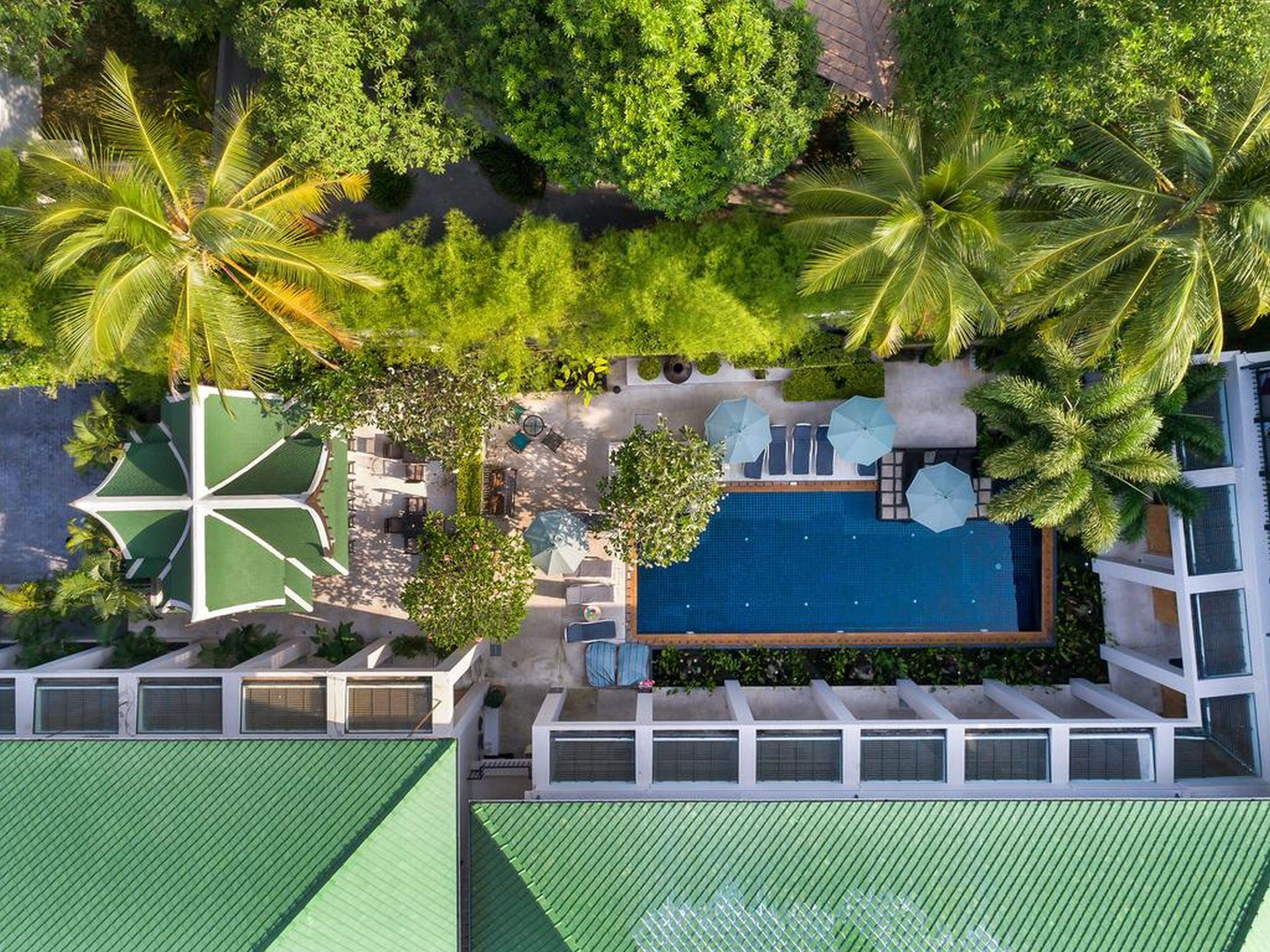 Outrigger Surin Beach Resort - Sha Extra Plus Exterior photo Aerial view of the hotel