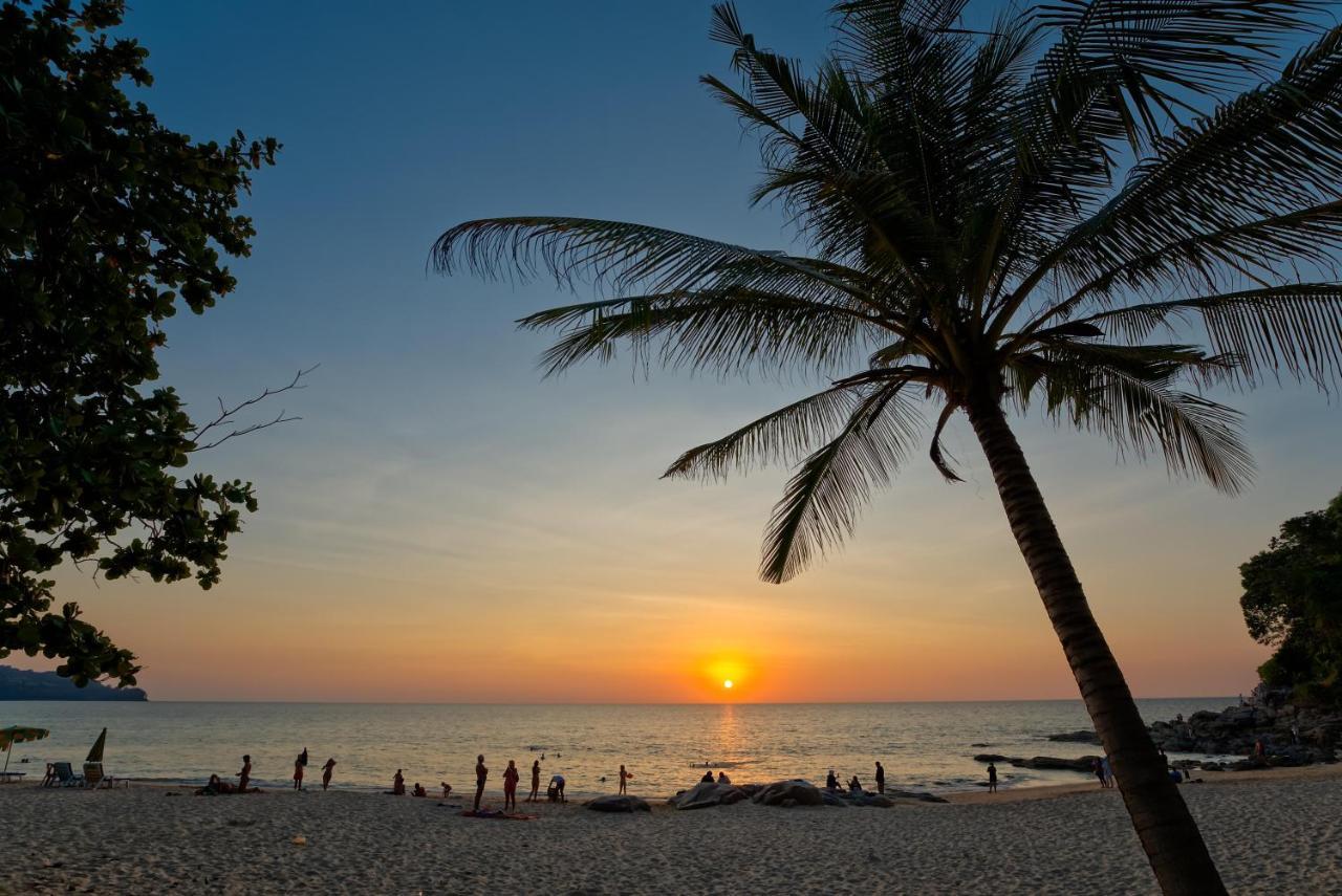 Outrigger Surin Beach Resort - Sha Extra Plus Exterior photo Sunset at Tanjung Puteri Beach