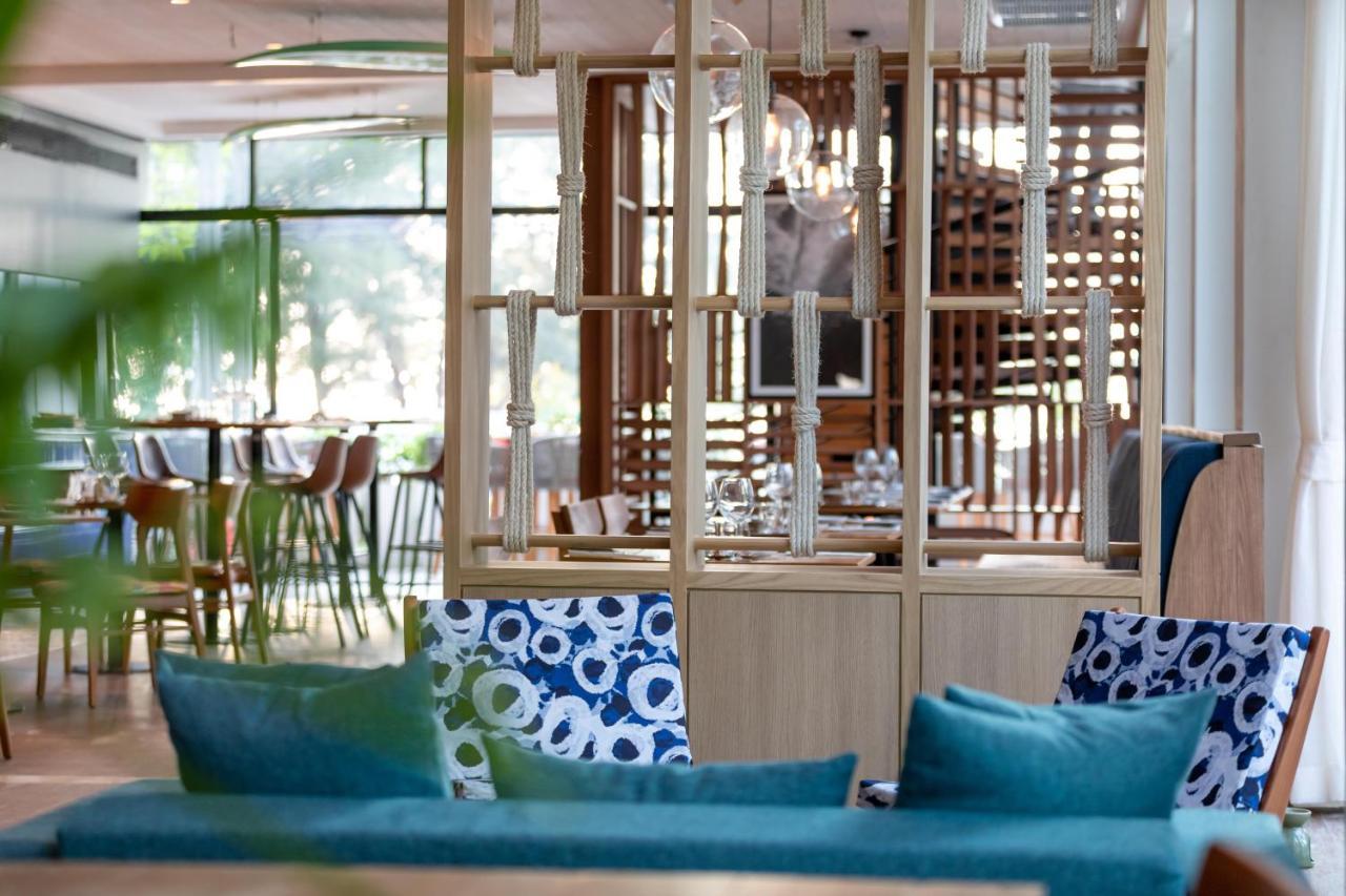 Outrigger Surin Beach Resort - Sha Extra Plus Exterior photo The restaurant