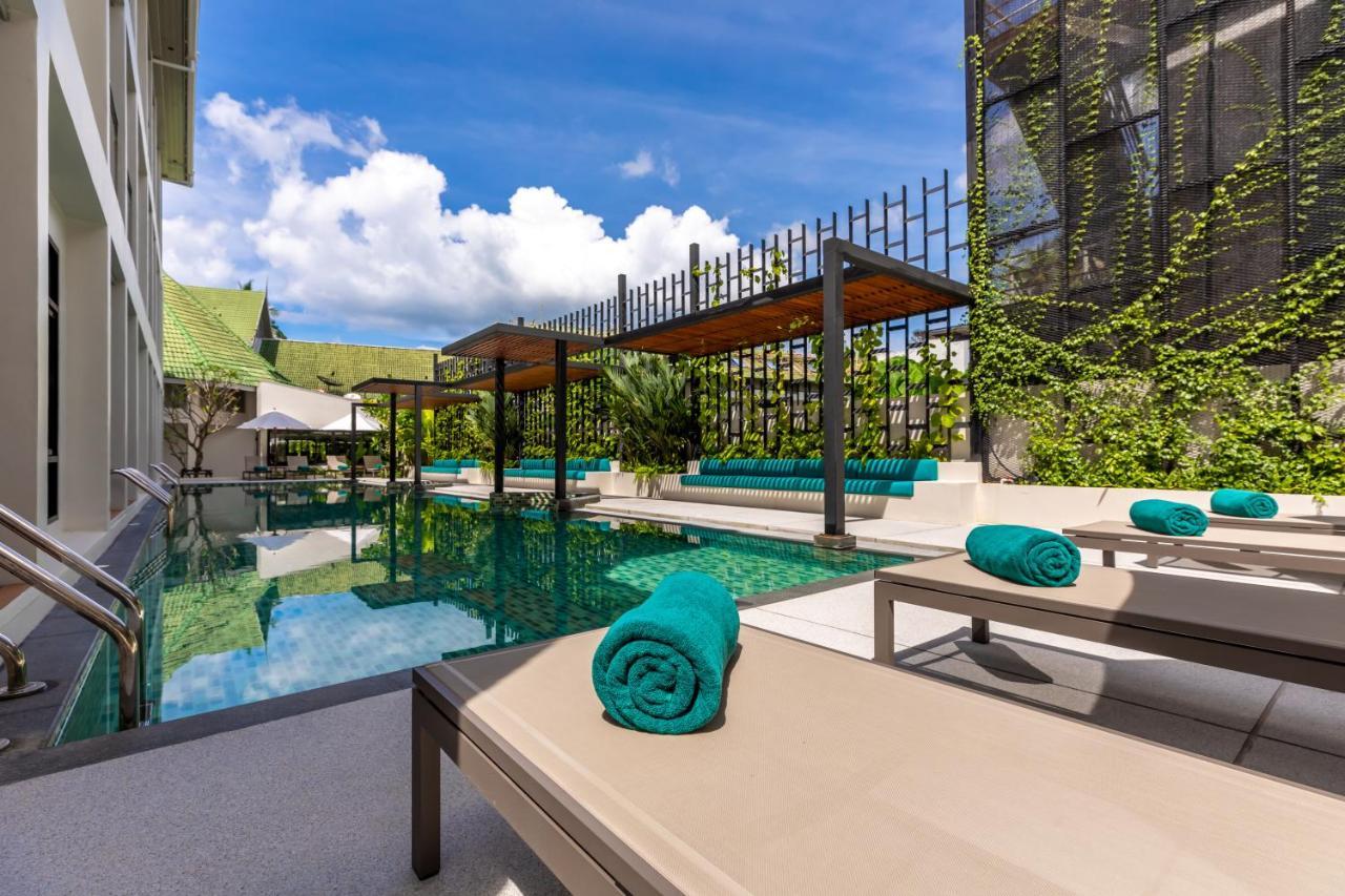 Outrigger Surin Beach Resort - Sha Extra Plus Exterior photo The swimming pool at the hotel