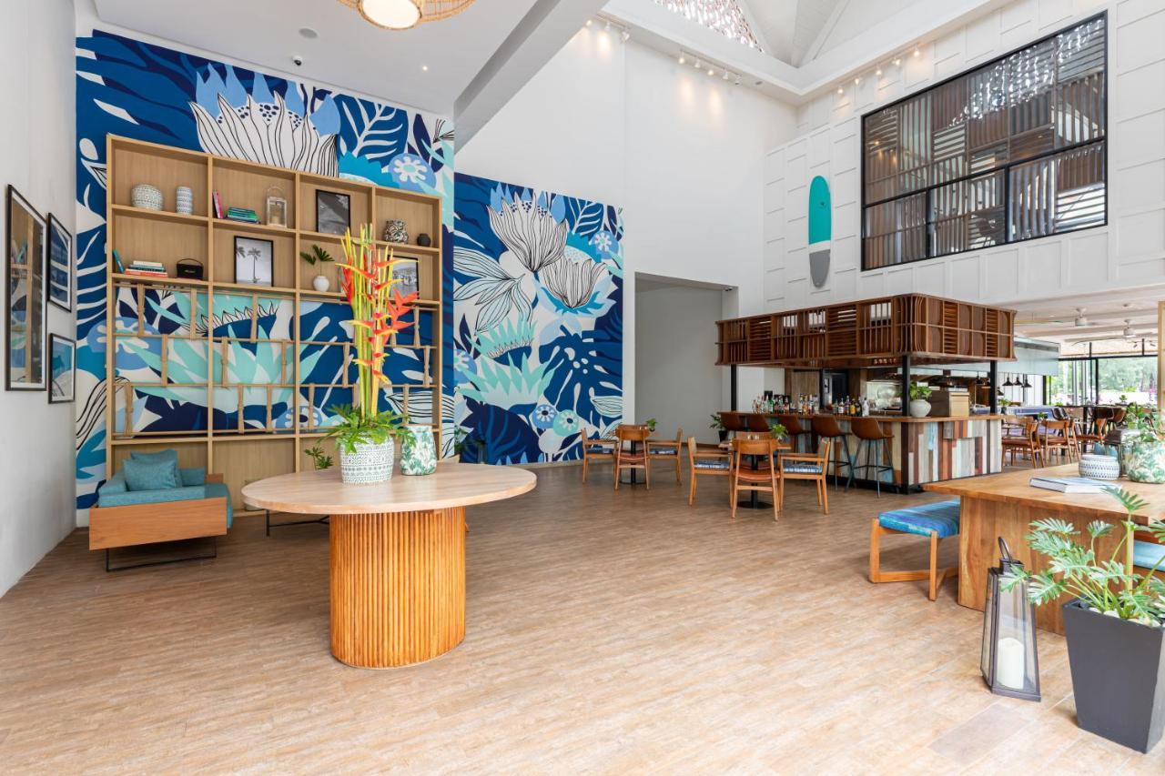 Outrigger Surin Beach Resort - Sha Extra Plus Exterior photo The interior of the library