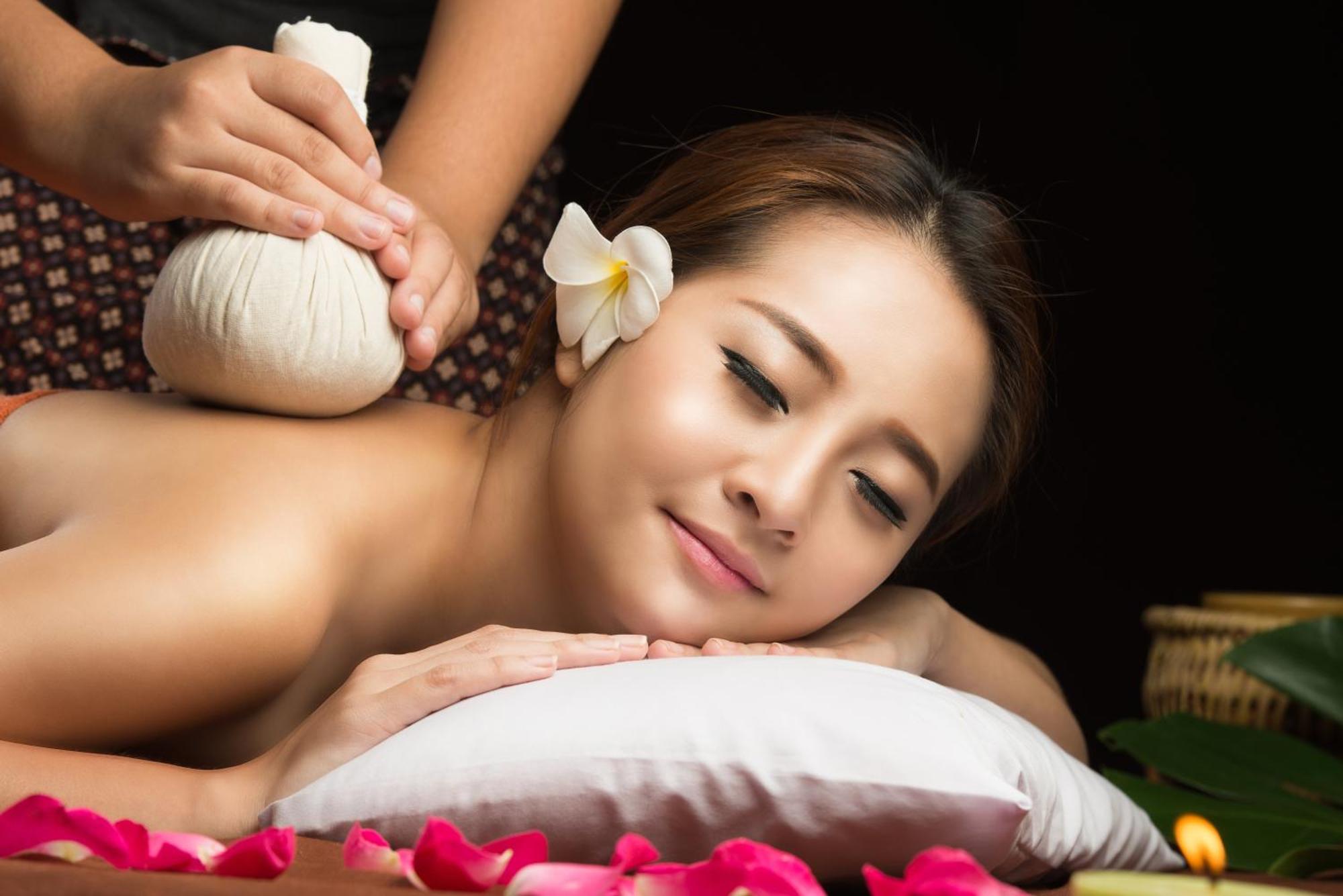 Outrigger Surin Beach Resort - Sha Extra Plus Exterior photo Thai herbal compress massage