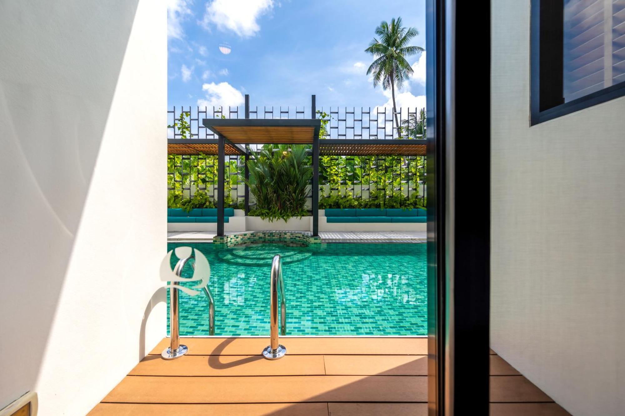 Outrigger Surin Beach Resort - Sha Extra Plus Room photo The swimming pool at the hotel